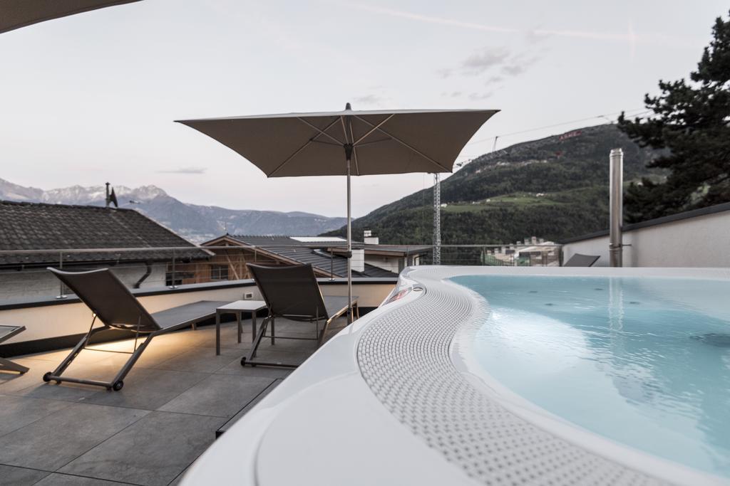 Alpin & Stylehotel Die Sonne Parcines Bagian luar foto